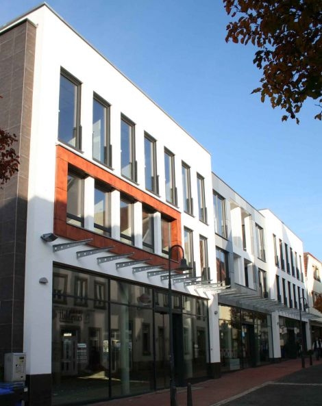 Fertigstellung eines Wohn- und Geschäftshauses