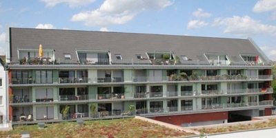 Schlüsselfertiger Neubau eines Wohn- und Geschäftshauses in Münster: 29 Wohnungen, Verbrauchermarkt und Tiefgarage